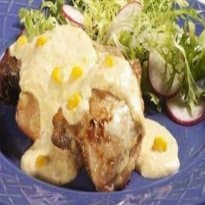 Sobrecoxa de frango com molho de milho