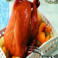 Peru assado recheado com arroz e amêndoas