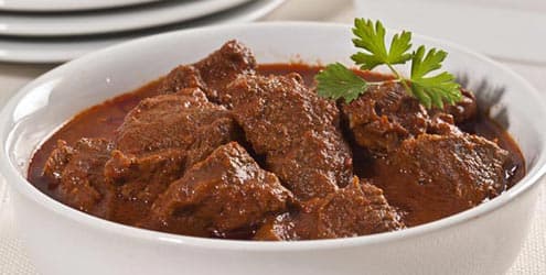 Acém cozido na pressão com molho de pimenta