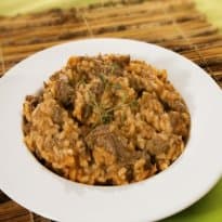 Risoto com tiras de filé